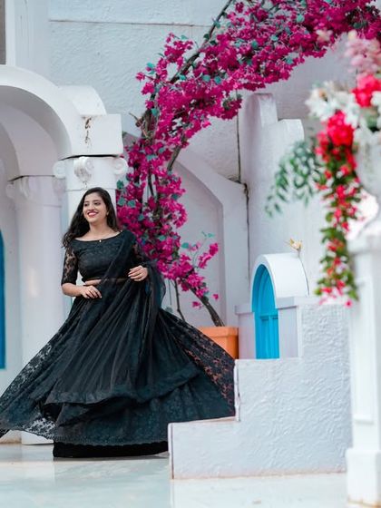 A couple dances on our Santorini-inspired set, with the white and blue architecture creating a beautiful, clean backdrop.