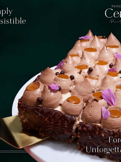 Simply irresistible, forever unforgettable. A close-up of my Go Nuts For Hazelnuts entremet, showcasing the intricate piping and delicate garnishes.