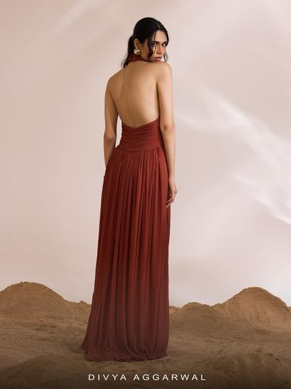The back view of the Luna Dress reveals its elegant, open-back design, expertly gathered to create a mesmerizing and modern look for special occasions.