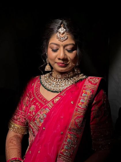 A serene, eyes-closed shot that showcases the beautiful eye makeup. The soft, blended eyeshadow and defined liner create a timeless and elegant effect.