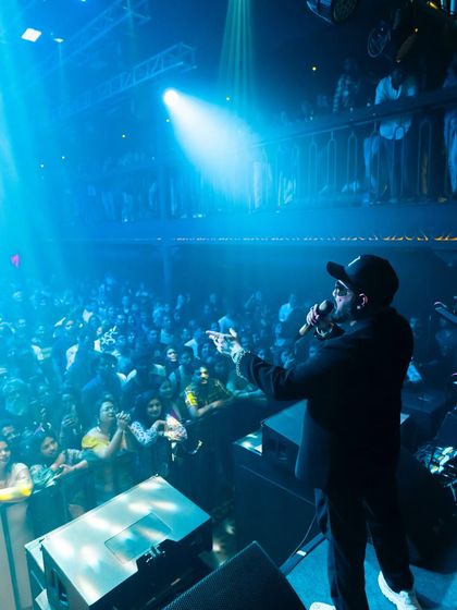 Mika Singh commands the attention of a packed club in Bangalore. I specialize in producing high-profile artist showcases in premium nightlife venues.