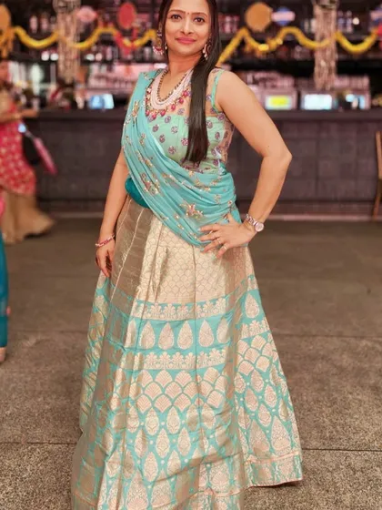 Dressed for the occasion at the Mamera function for the Parekh family. As your anchor, I make sure to blend in with your celebration's theme while bringing my unique energy to the stage.
