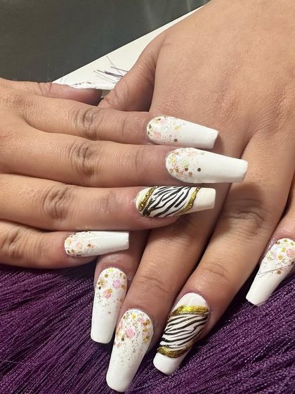 Another look at this popular white and zebra print combination on long coffin nails.