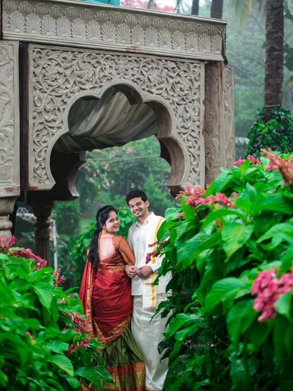 A beautiful pre-wedding shoot at Elements Bangalore, where the couple's traditional South Indian attire is perfectly framed by lush greenery and classic architecture.