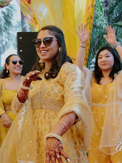 The bride leading her squad on the dance floor. The Haldi ceremony is also a time for celebration and dance, and I make sure the playlist is perfect for it.