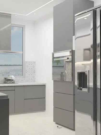 A sleek, modern kitchen with high-gloss grey cabinets and a built-in appliance tower. This design is all about clean lines and a minimalist aesthetic for urban living.