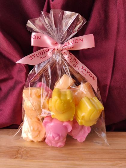 Make bath time more fun for kids with these cute animal-shaped soaps. This little bag of bear soaps is a great example of a simple, budget-friendly party favor that can be customized in various colors.