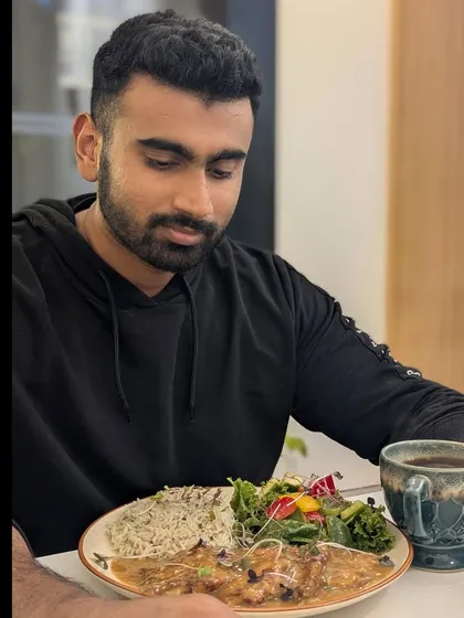 Enjoying a well-balanced meal. It's important to be mindful and savor your food as part of a healthy lifestyle.