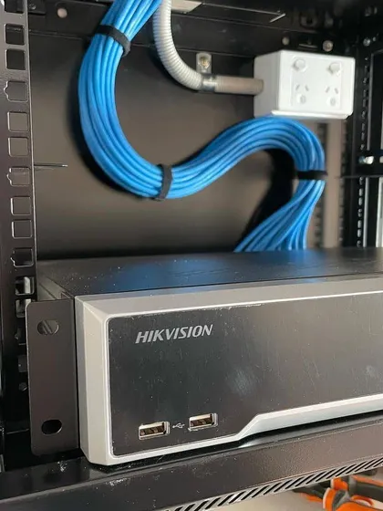 We believe in clean and professional work. This is a Hikvision NVR setup with neat cable management in a server rack. No messy wires, just a reliable system that is easy to maintain. BEST SERVICE, ALWAYS.