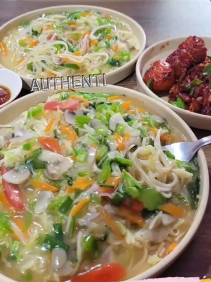 A comforting meal of chowmein and chicken starters. This is the kind of food that is perfect for sharing with friends on a casual evening.