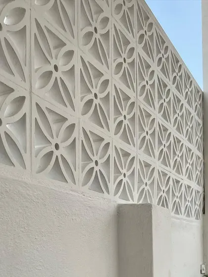 The beauty is in the details. This intricate jaali or breeze block wall adds a decorative touch and provides ventilation while maintaining privacy. It’s a simple element that adds so much character to the space.