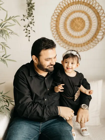 A sweet and gentle moment between a father and his little girl.