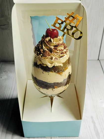 My Mocha Mirage Delight, created specially for Rakhi. It's an elegant dessert glass layered with chocolate cake, coffee mousse, almond praline, caramel, and chocolate chunks.