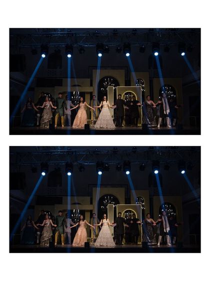 The bride and her family take the stage for a performance. The dramatic spotlights and grand backdrop make every performance feel like a professional show.