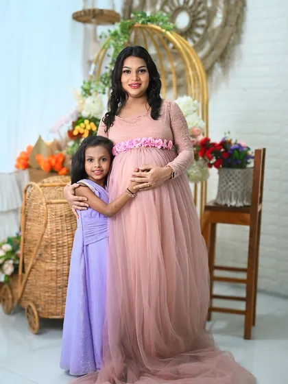 Maternity sessions are even more special when the whole family is involved. Here, we captured the excitement of a big sister-to-be, creating a beautiful memory before the new baby arrives. I provide beautiful gowns for moms to make them feel amazing.