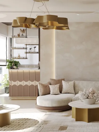 This living room was imagined as a space where luxury feels soft and inviting. Curved forms in the sofas and a sculptural gold chandelier flow effortlessly through the room, creating a feeling that is both serene and celebratory.