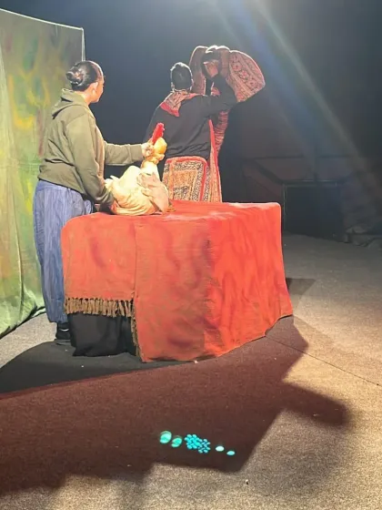 Another moment from 'Be Yourself', highlighting the interaction between the elephant and bird puppets. The use of simple props and expressive puppetry brings the story to life.