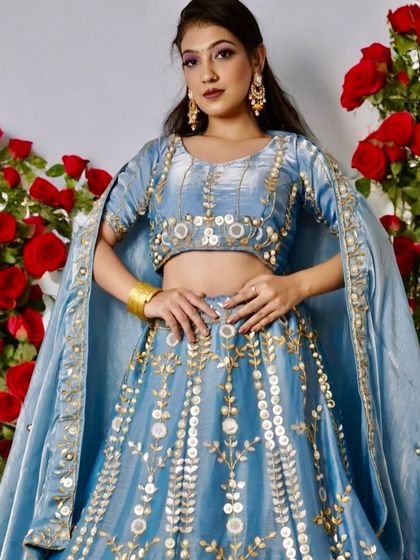 This look, taught in my pro makeup course, features a bold purple winged eyeshadow on a pastel blue lehenga. It's a perfect example of how to use color theory to create a striking, modern ethnic look.