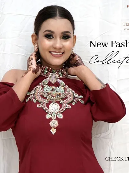 Check out our new fashion collection. This close-up shows the intricate detail of the embellished neckline on our maroon gown.