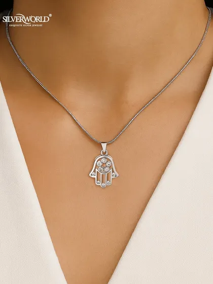 Invite blessings and protection with our Hamsa Hand pendant. This elegant necklace, crafted in sterling silver and adorned with sparkling Zirconia, is a modern symbol of good fortune and a shield against harm.