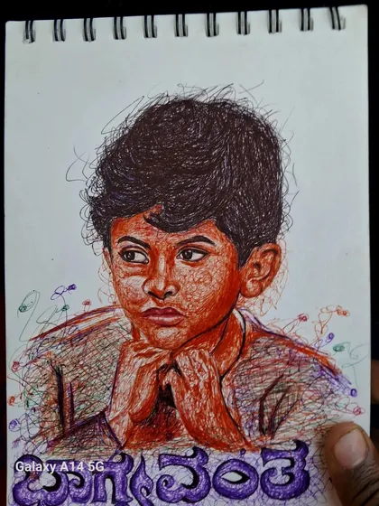 A close-up of my scribble art portrait of a young Puneeth Rajkumar from the movie "Bhagyavantha". This style uses chaotic lines to create a surprisingly detailed and emotional image.