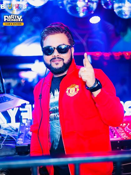 Excellence is not a skill, it's an attitude. A confident shot of me at the console, ready for the night.