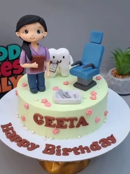A sweet cake for a dental assistant, recreated from an AI reference image. It features a custom figurine, a happy tooth character, and a miniature dentist chair, all made from fondant.