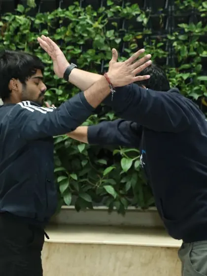 My goal is to teach you how to end a fight as quickly as possible. Here, I demonstrate a 360-degree defense to block an incoming strike and immediately close the distance for a counter.