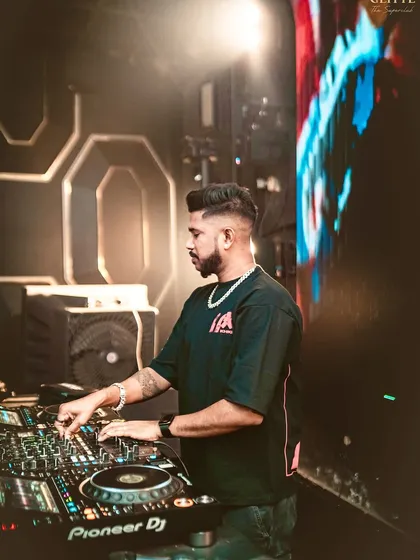 A close-up of me mixing on the Pioneer DJ console at Glitte. This shot highlights the technical side of my performance.