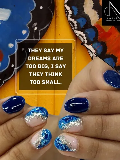 "They say my dreams are too big, I say they think too small." This bold blue and silver glitter design is for the dreamers.