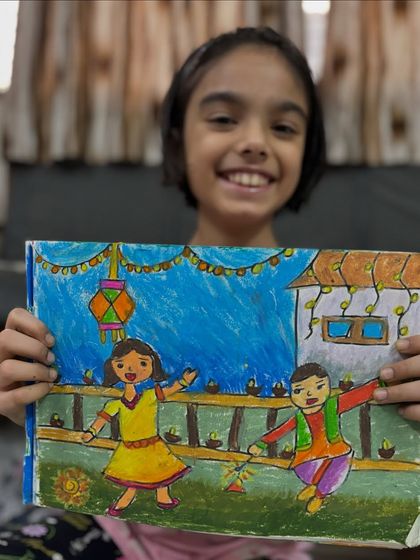 This memory drawing by a 3rd-grade student shows a happy Diwali celebration. Learning to draw from memory is a key skill we practice in my classes.