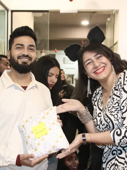 Fun and laughter at a corporate Christmas party. I also cover office parties and social gatherings, capturing the team's energy and candid interactions.