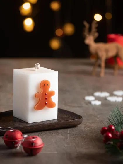 And here is the square pillar candle with an adorable gingerbread man motif.