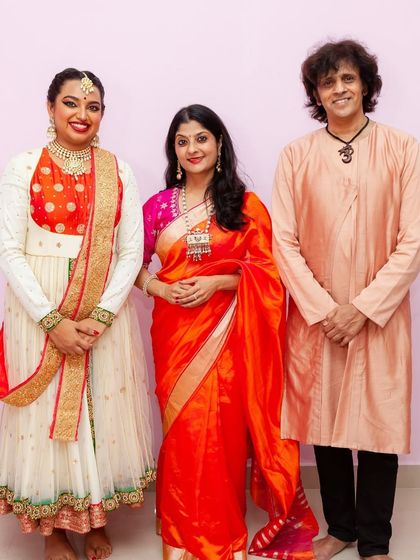 A proud moment with our student Prerana and my husband Rajendra after her successful solo concert. We celebrate every milestone in our students' journey.