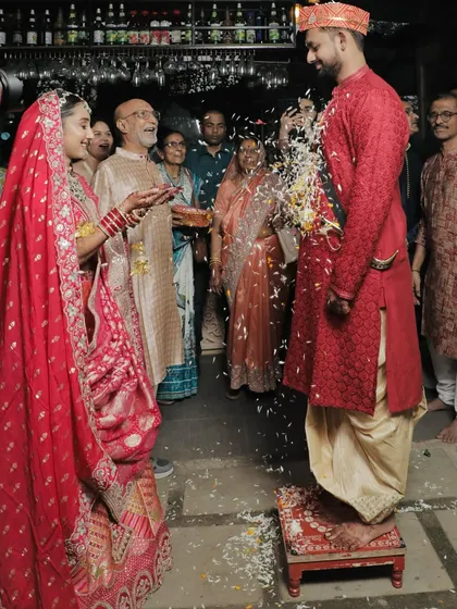 A beautiful moment from a traditional Garhwali wedding ceremony. The bride's makeup is elegant and timeless, perfectly suited for the sacred rituals.