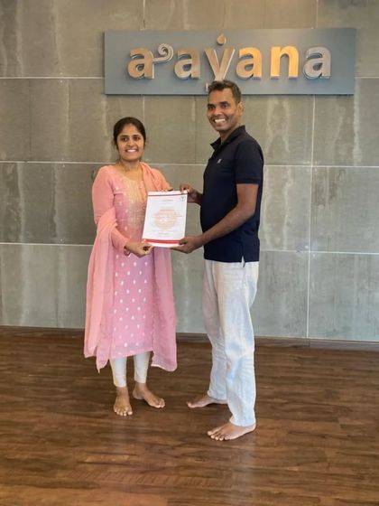 Our founder, Regeesh, presents a certificate to a new teacher. We believe teachers have three loves: love of learning, love for learners, and the love of bringing the two together.