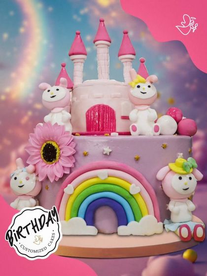 A whimsical castle cake with a rainbow and adorable characters. This two-tier creation is a fantasy world brought to life, perfect for a child with a big imagination.