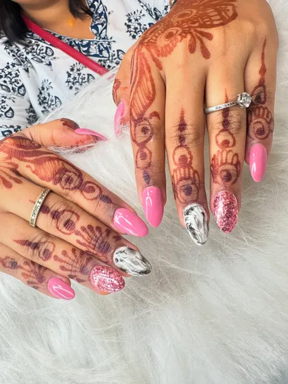 Another view of this party-ready nail set, showing how the different designs on each nail come together for a cohesive, stylish look.