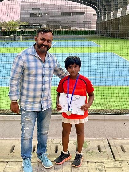 A father and son celebrate a successful tournament outcome. The involvement of family is something we deeply value and encourage at PBI.
