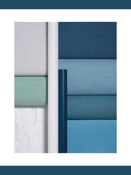 A palette of blues. This collection of fabric swatches shows the range of tones and textures I work with, from light sky blue to deep navy, each chosen for its unique character.