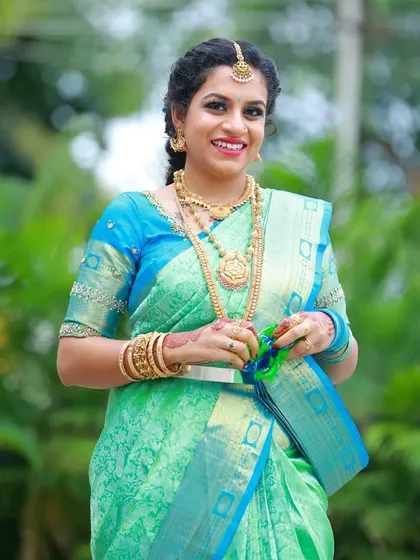This is the perfect look for a family wedding. I created a soft glam look with defined eyes and a natural base for Kavya, making her feel beautiful and confident for her cousin's big day.
