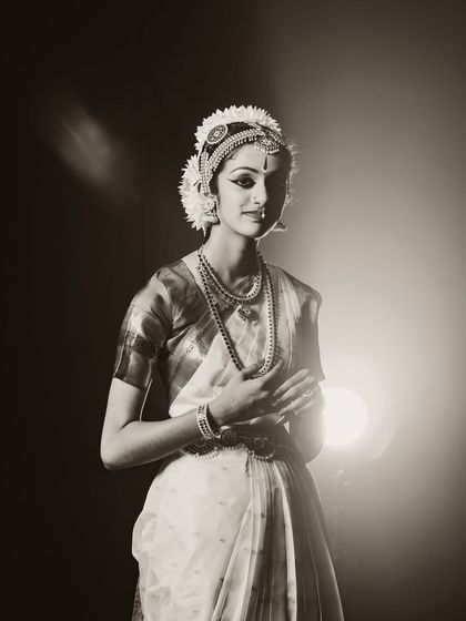 A duplicate of the previous image, this classic portrait of a Bharatanatyam dancer showcases the beauty of traditional Indian dance.