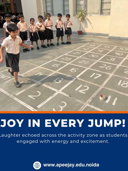 Joy in every jump. Laughter echoed across the activity zone as students engaged with energy and excitement in this classic playground game.