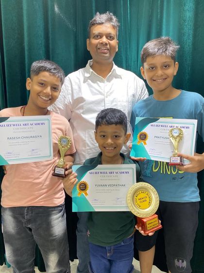 A group of our successful abacus students from the Charni Road branch posing with their well earned awards.