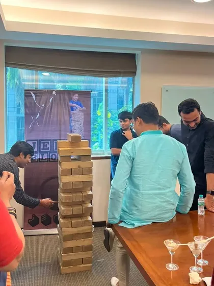The tension and excitement of a life-sized Jenga game. Activities like these are perfect icebreakers and encourage employees to strategize and have fun together outside of their usual work roles.