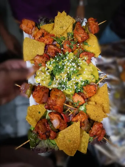 Our Chicken Shashlik platter is perfect for sharing. Skewers of marinated chicken tikka are served with nachos and a creamy Lebanese-style dip.