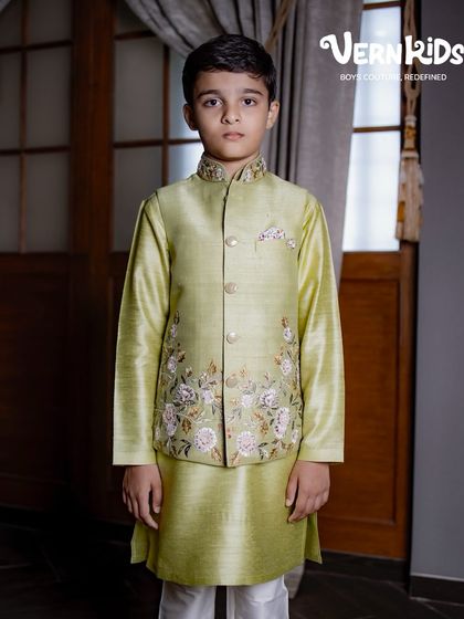 Weddings just got an upgrade for boys too. This sage green Bundi set, handcrafted with floral embroidery, is where comfort meets royal charm.