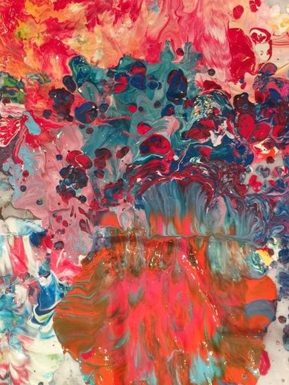 A beautifully chaotic and colorful canvas created during a group art activity. This piece shows the result of layering multiple colors and techniques.