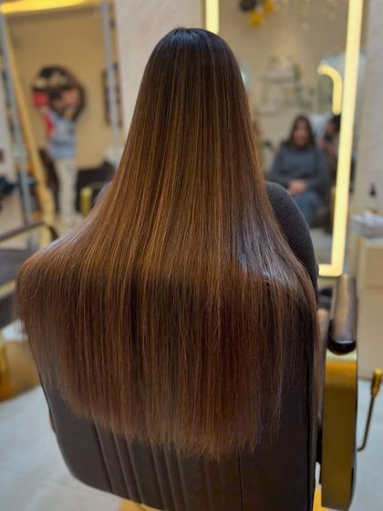 Another look at the beautiful caramel brown colour on long, healthy hair. The shine and smoothness are incredible.