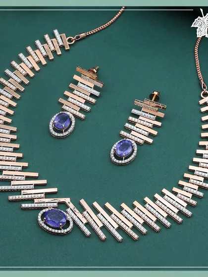 The full Royal Blue necklace and earring set, a statement of bold color and architectural design.